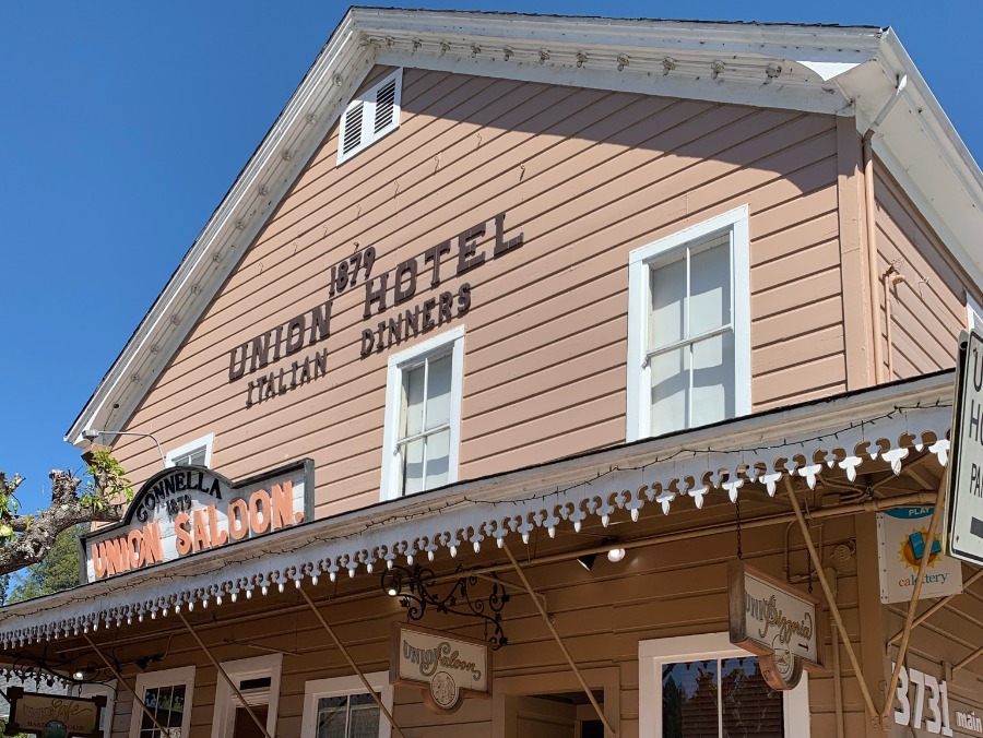 Front of Union Hotel Saloon in Occidental Sonoma County with wood paneling and old west decor